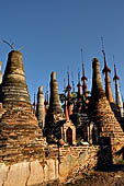 Inle Lake Myanmar. Indein, on the summit of a hill the  Shwe Inn Thein Paya a cluster of hundreds of ancient stupas. Many of them are ruined and overgrown with bushes.